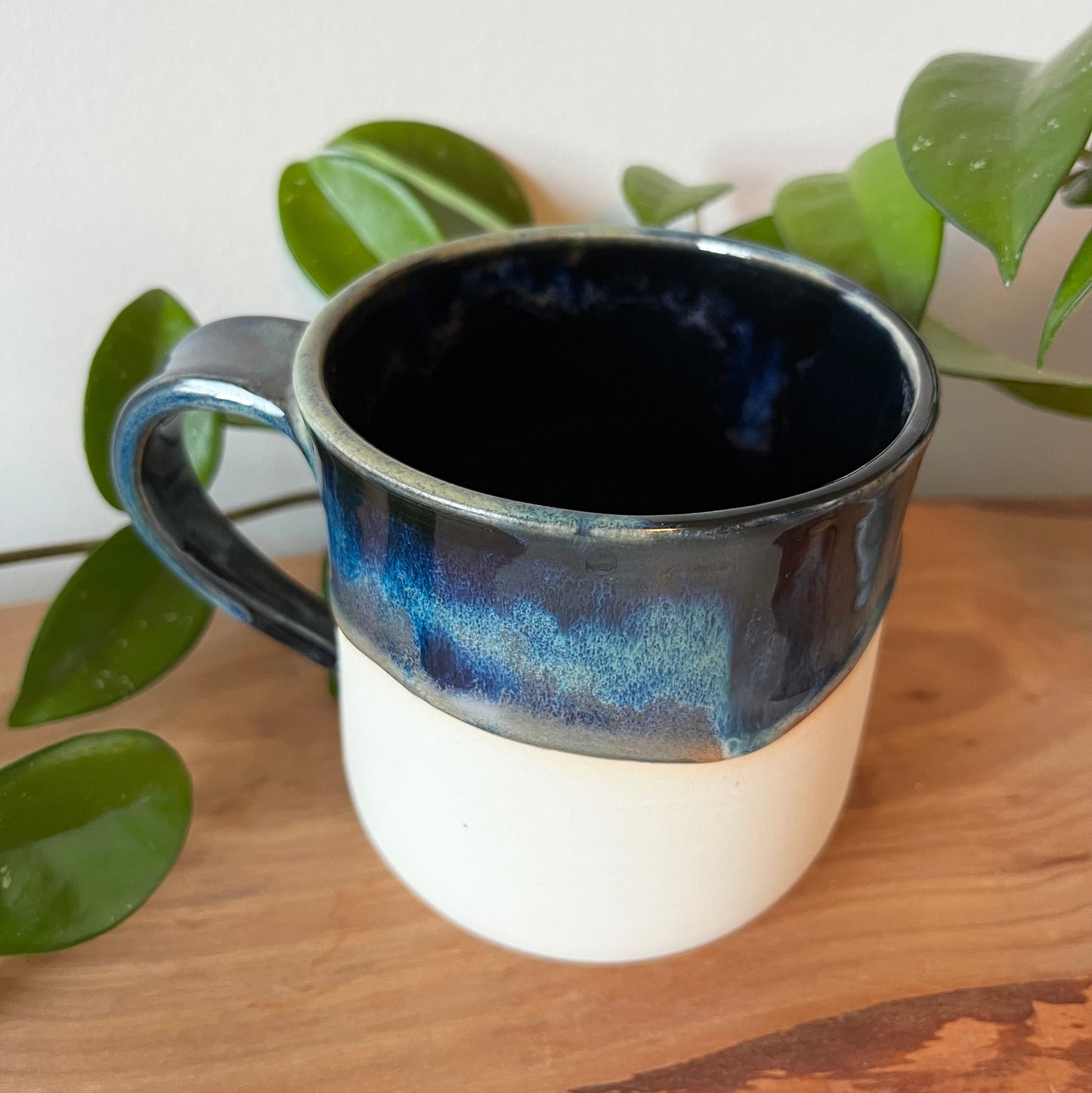 Northern Lights Mug with Snowy Cabin