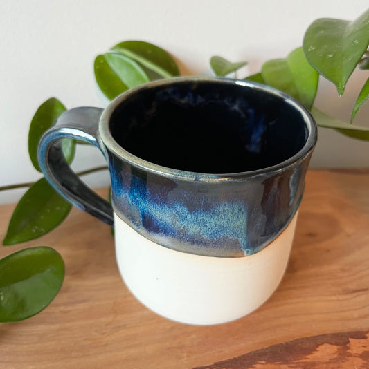 Northern Lights Mug with Snowy Cabin